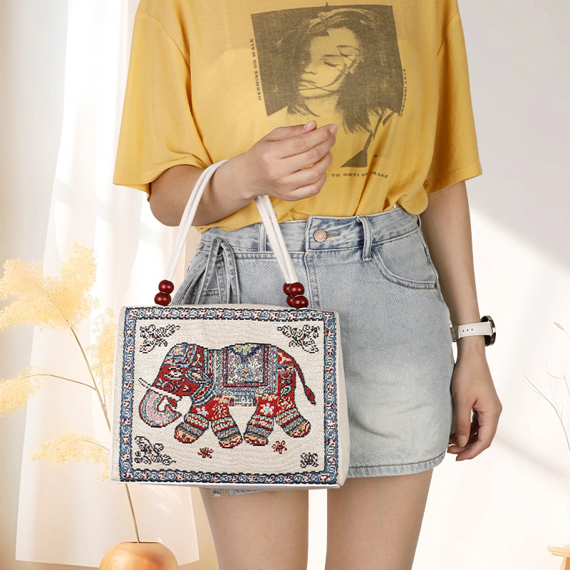 针织刺绣大容量民族风手提包双面金丝提花通勤旅游帆布包国风刺绣