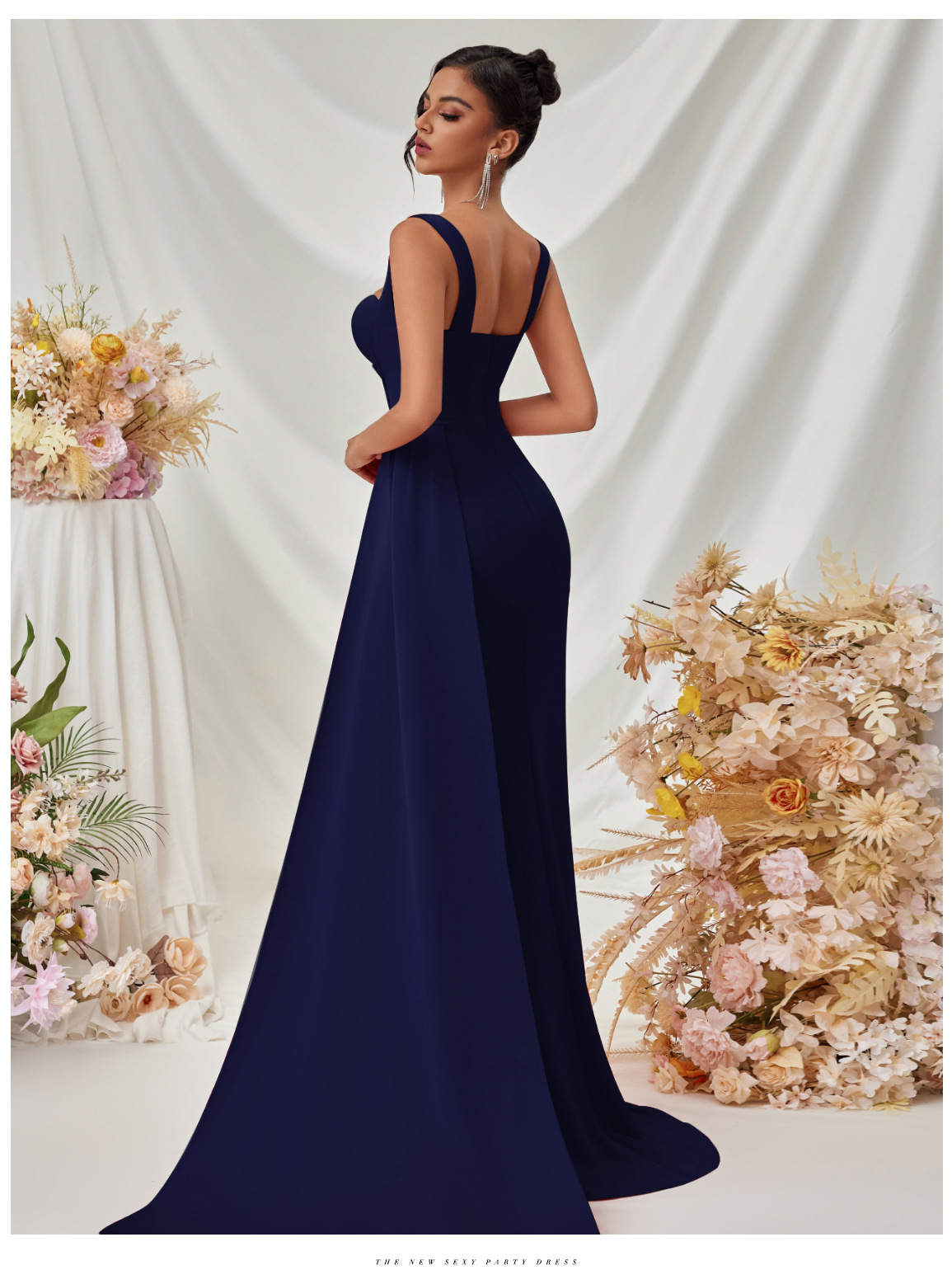 Nuevo vestido de noche sexy dividido de estilo europeo y americano, vestido largo con tirantes delgados de cadera de temperamento femenino de alta gama en stock