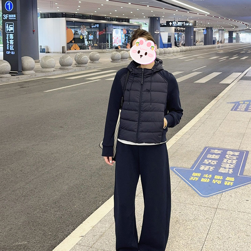 藏青色松弛感拼接连帽棉服女2025冬季新款时尚休闲保暖棉衣短外套