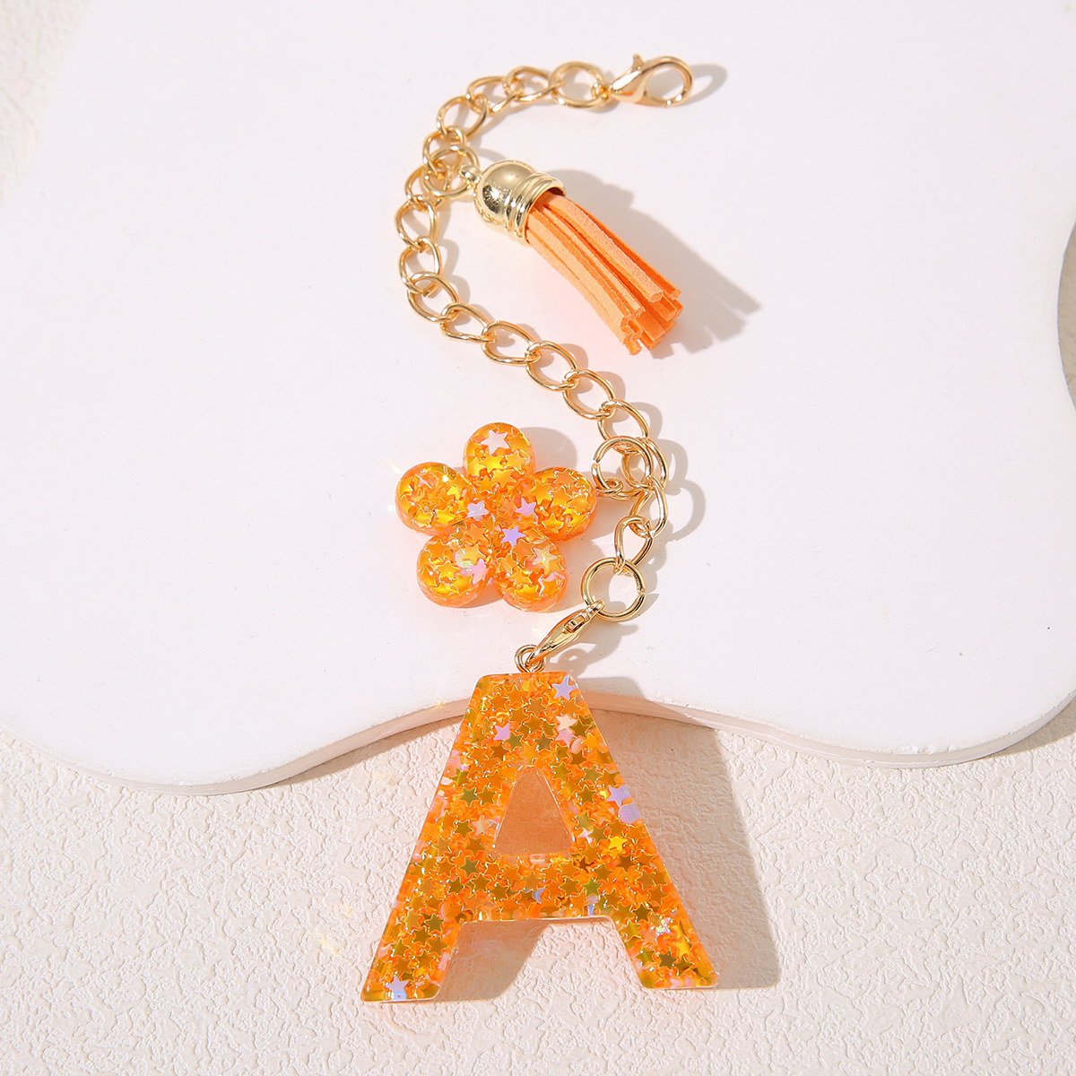 Mayorista Amazon Stanley Cup Chain Keychain Joyería de goteo de gel sequilla flores letras de estrellas llavero mujer