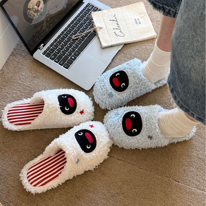 Officially licensed Pingu Penguin plush slippers, a couple's set, featuring non-slip soles, warmth, and added fleece lining Officially licensed Pingu Penguin plush slippers, a couple's set, featuring non-slip soles, warmth, and added fleece lining