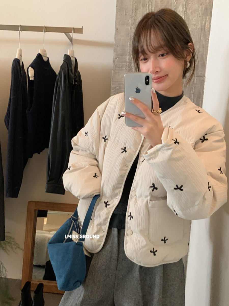 Cute winter fashionable suede down jacket with a round collar with…