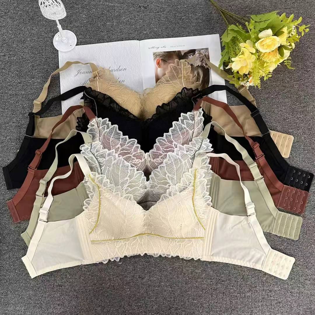 Nuevo sujetador de alta calidad de moda de encaje jacquard transpirable y cómodo ajustable anti-caída reunido tres filas de ropa interior de botón