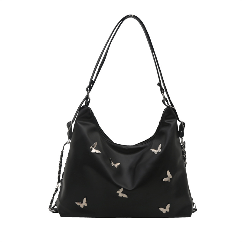 Bolso de cadena de moda popular para mujeres 2024 verano nuevo bolso de hombro de gran capacidad nicho mariposa mochila de trabajo