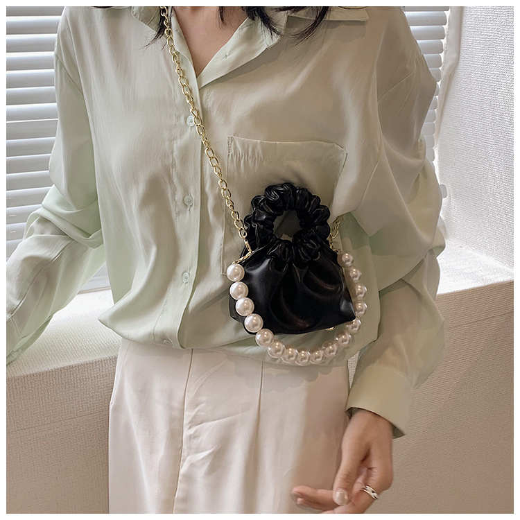 255g Weight Beading, Pearls Fashion Element Clasp Frame Closure Type Top Handle, Chain Strap Type Crossbody Bag Bags Type Casual, Daily, Shopping Occasion Pu Leather Material Solid Color Pattern All Seasons Season Kid'S Gender Cute Style Bucket Shape Kid'S Pu Leather Solid Color Cute Beading Pearls Bucket Clasp Frame Crossbody Bag 38