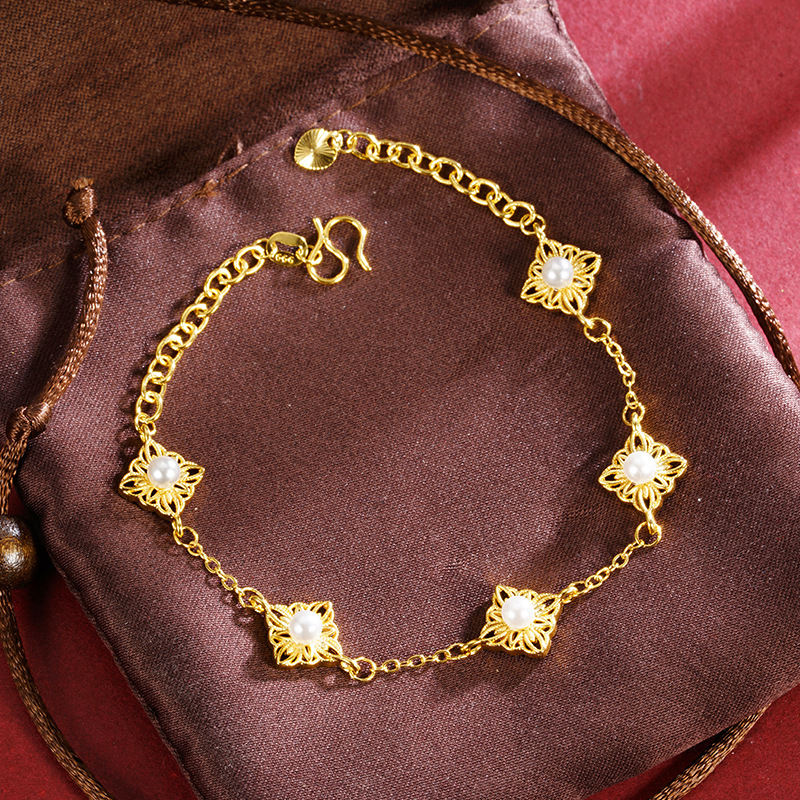 Brazalete de mujer de oro de oro de Vietnam flores huecas de moda ligera de lujo fabricantes de flores de cuatro hojas Yiwu al por mayor de joyerías transfronterizas