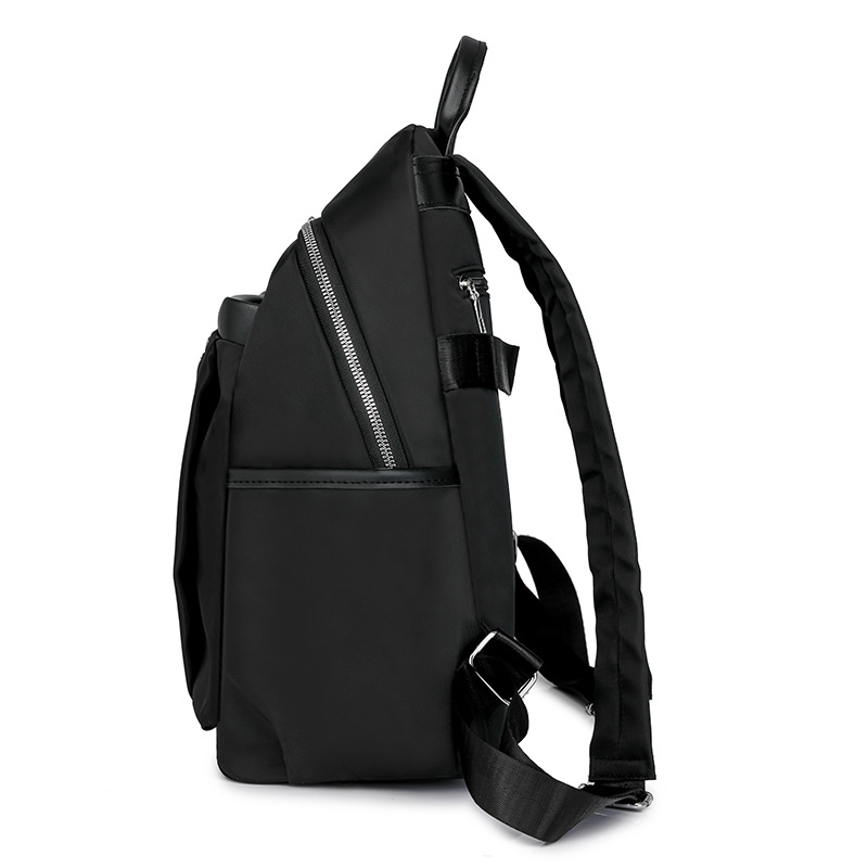 Mochila de nailon para mujer 2024 nueva moda salvaje para mujer mochila para desplazamientos urbanos mochila de gran capacidad al por mayor