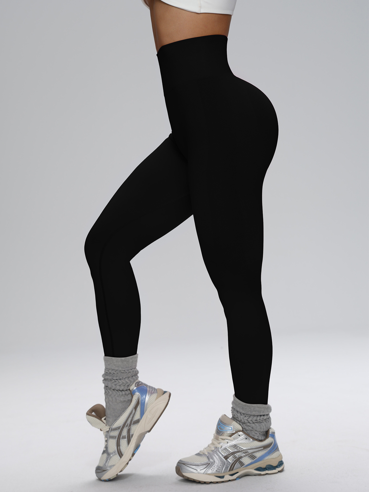 Europa y los Estados Unidos sin costuras cintura alta pantalon de gimnasio de alta cadera para mujeres corriendo al aire libre apertado nueve pantalones de pelusa de miel