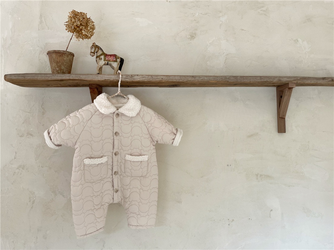 INS estilo coreano bebé niños y niñas de invierno solapa bolsillo de manga larga mono de algodón fino mameluco acolchado forrado de lana larga marea escalada