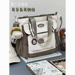 高颜値衝突色百合斜めショルダーバッグ風小清新学生授業リュックサック新型大容量ショルダーバッグ代発