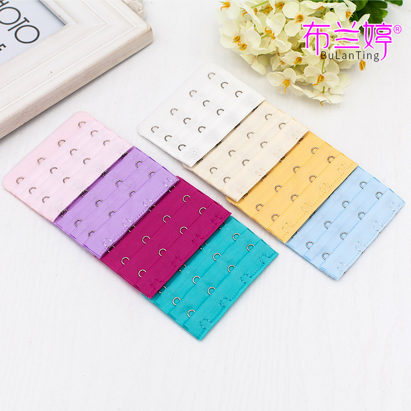 Stainless steel three rows and four buttons bra extension buckle Three rows and four buttons bra back buckle Unpackaged bra extension buckle