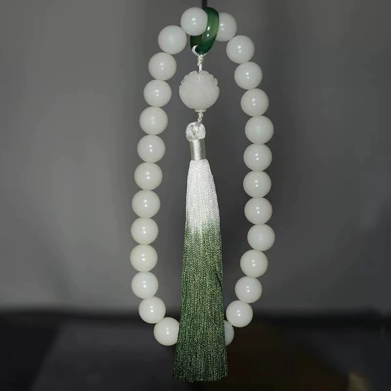 Бодхи- Defines: rosary with tassels?