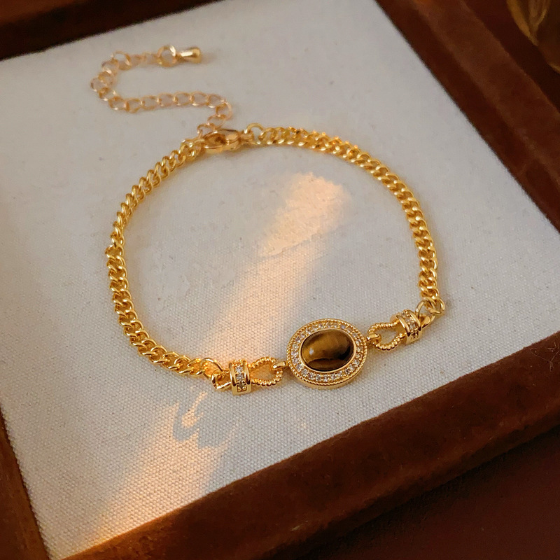 Pulsera de ojo de tigre ovalada de oro real pulsera de temperamento retro de todo fósforo de moda, joyería de alta calidad al por mayor image 7