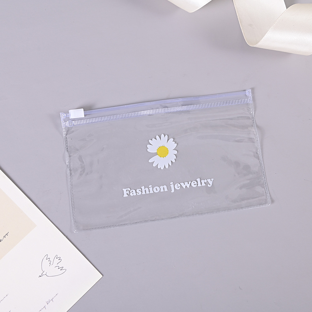 Estilo coreano fresco Margarita de plástico transparente Ziplock bolsa ropa interior bolsa de embalaje en stock al por mayor bolsa de embalaje de PVC