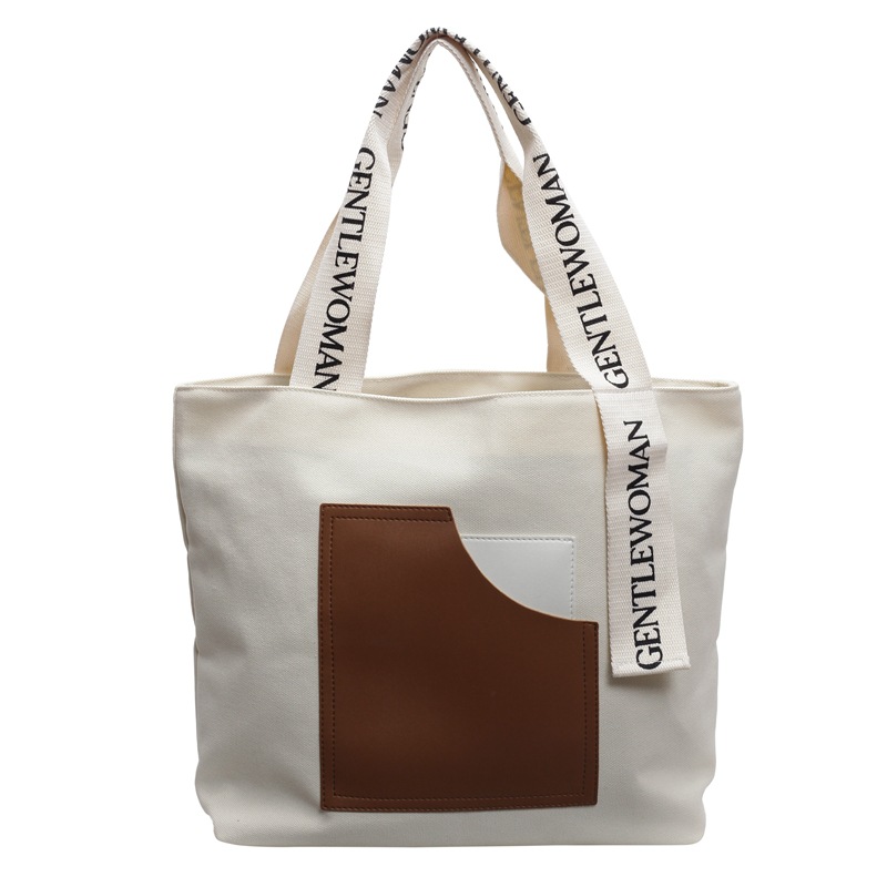 Fábrica directa tote bolsas de lona de niñas bolsas de hombro resistentes al desgaste simple letras impresión bolsas de comercio exterior transfronterizas