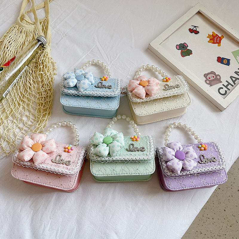 Nuevo bolso para niños de estilo extranjero, bolso de regazo de sequilla de niña, bolso de perla coreano, bolso de cambio de niña