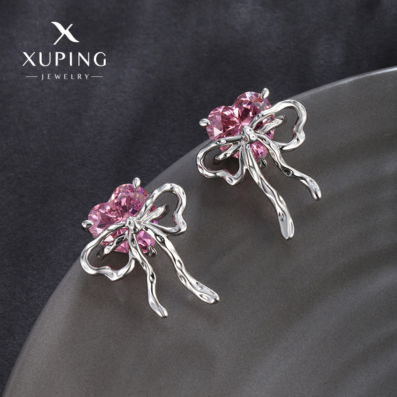 Xuping Color Bao serie de amor arco diseño pernos de orejas para mujeres de alta calidad sensación de viento frío dulce sensación fría pernos de orejas