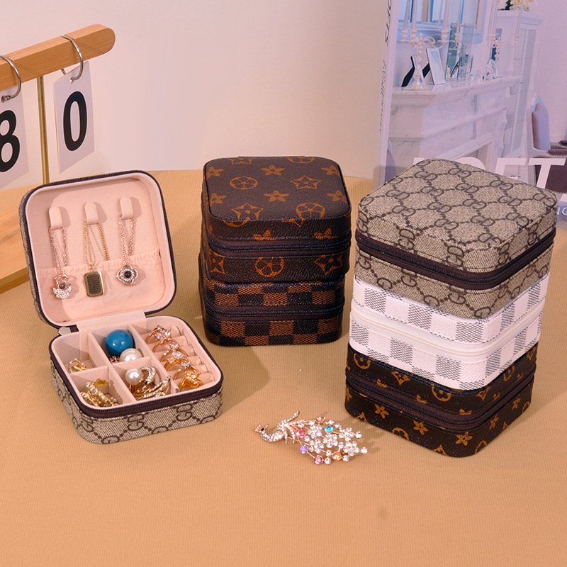 Pu caja de almacenamiento de joyería fabricantes de pendientes collares embalaje de joyería caja de almacenamiento anillo casero caja de joyería portátil