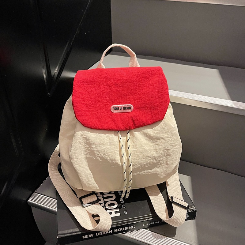 Mochila de moda pequeña mochila casual para mujeres 2025 nueva bolsa de viaje de gran capacidad bolsa de viaje al aire libre