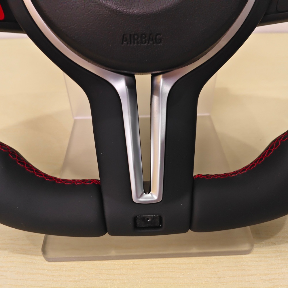 New red button with stitching alignment suitable for all BMW models, including the F10, F30, E90, and E92 steering wheels