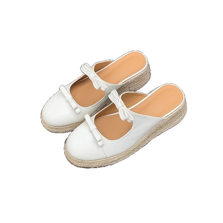 Versión de piel de oveja ~ Pastel de plataforma retro Baotou bowknot sandalias y zapatillas 2025 verano nuevo estilo ropa exterior media pantuflas mujeres