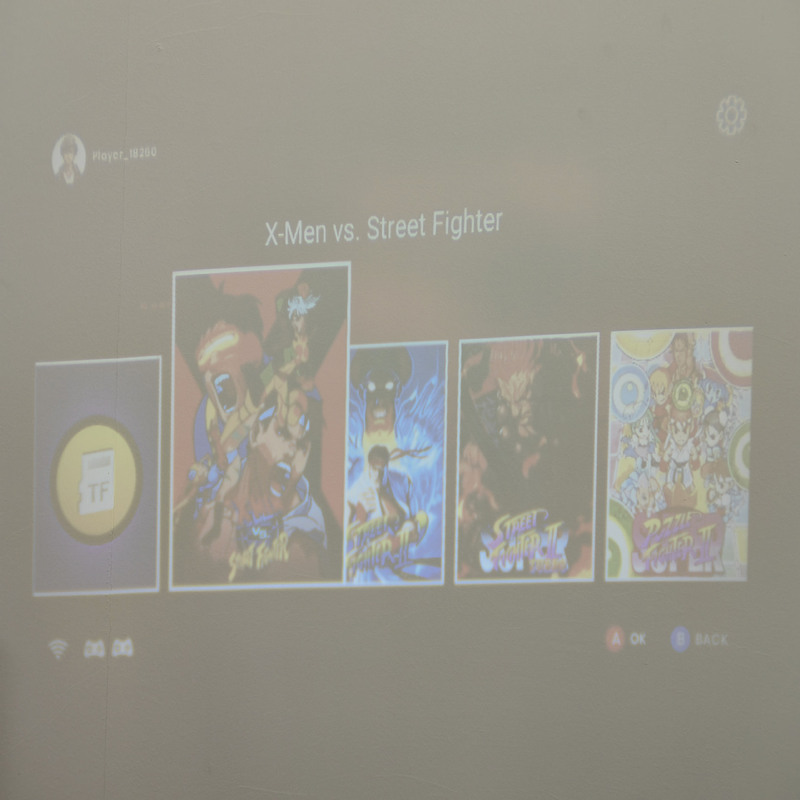 ゲームメイトの正規版ゲームハンドルはhy300プロジェクターを接続してネット対戦ゲームをすることができます。|undefined