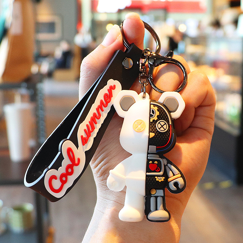 Oso mecánico llavero muñeca colgante coche llavero accesorios hombres y mujeres bolso muñeca adornos pequeño regalo al por mayor