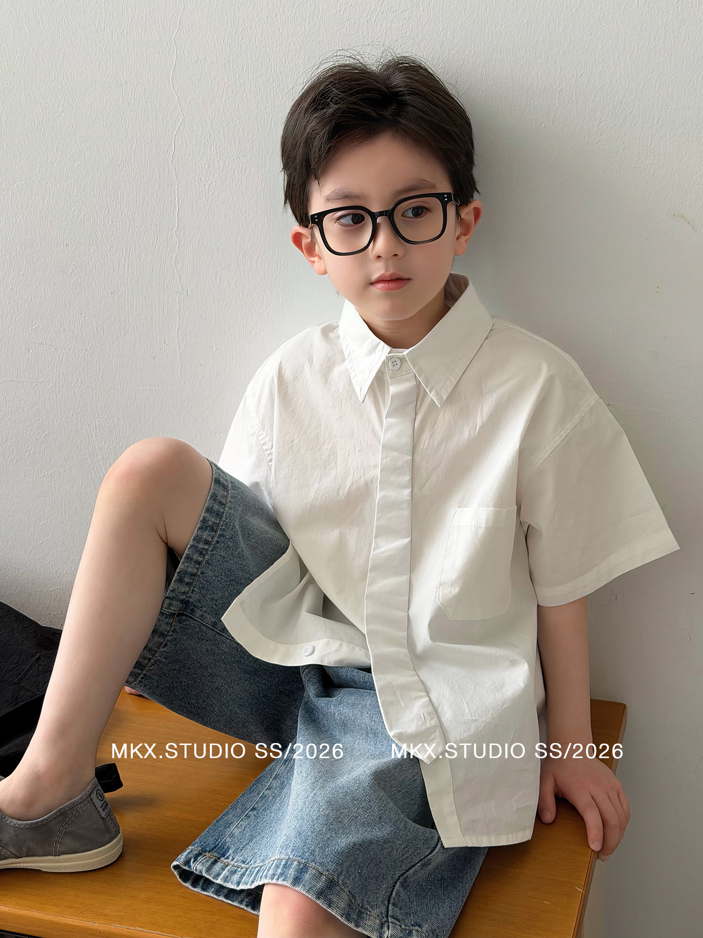 Camisas de mangas cortas para niños 2026 ropa infantil de verano nuevo estilo coreano ropa de verano para niños camisas mayores al por mayor