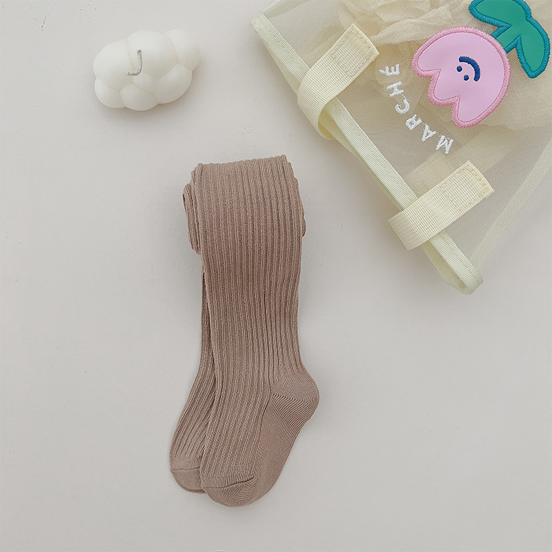 Nuevo color sólido rayas verticales polainas de las muchachas del otoño y el invierno estilo coreano ocasional los niños ropa exterior pantimedias blancas en stock