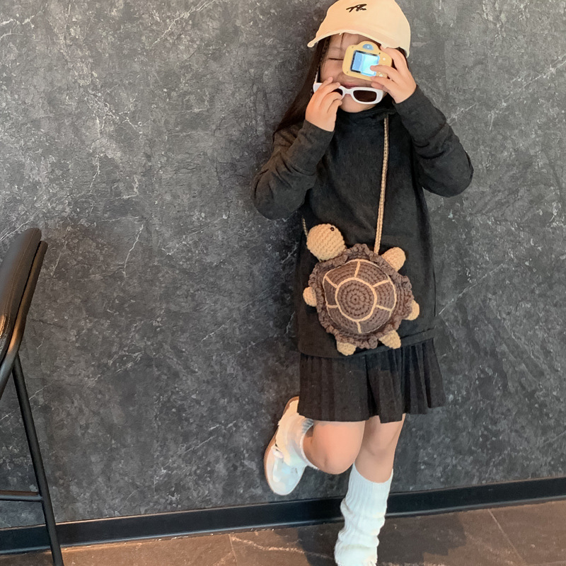 2025 otoño y invierno nuevo bolso infantil lana gancho tejido pequeña tortuga bebé bolso de cambio caricatura lindo mochila de hombro