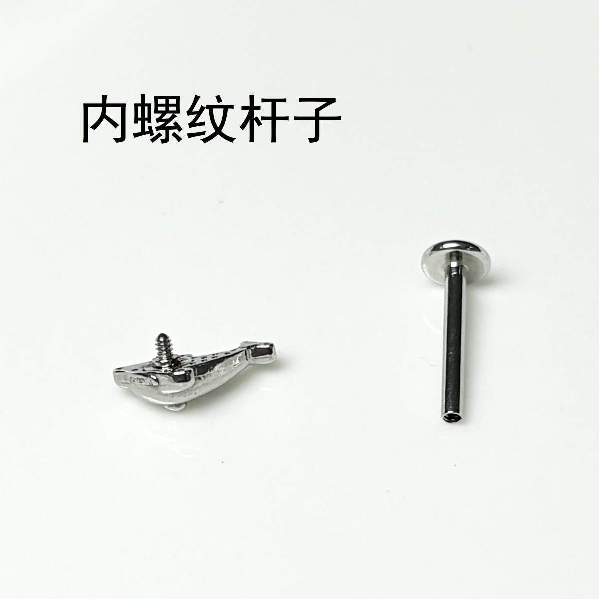 Silver pointed spike labret stud material detail