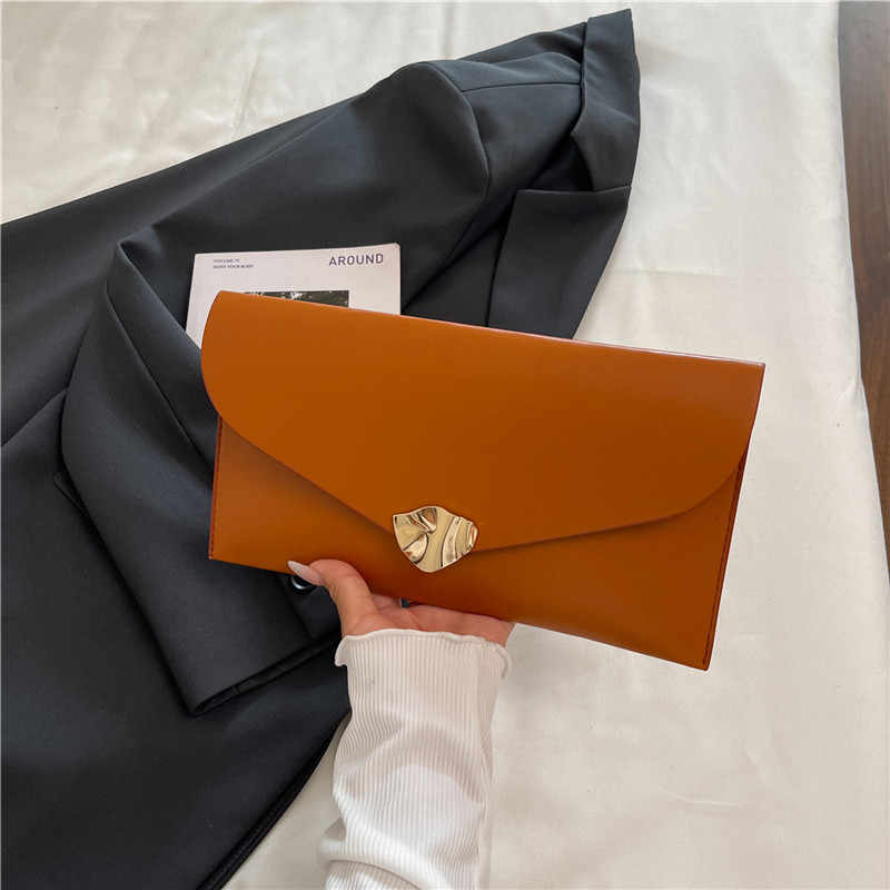 Tendencia de estilo extranjero nueva bolsa de sobres de gran capacidad de otoño 2025 moda casual simple estilo coreano bolso de mano de mujer