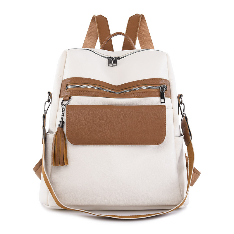 2024 nueva mochila de PU de moda casual para mujer, borla de moda, mochila de viaje de color sólido de gran capacidad al por mayor