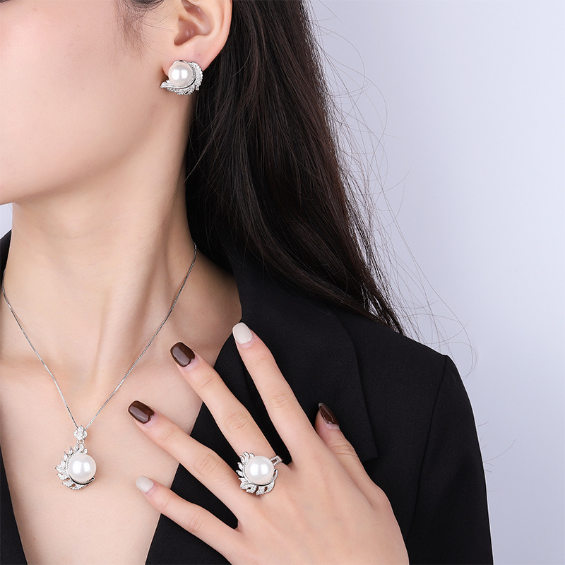 Zhuang Sheng joyería de cobre inferior chapado en oro con incrustaciones fritillary perla de la moda de diamantes incrustados cuentas grises traje creativo 14 mm12mm