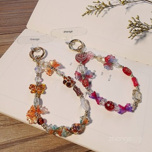 exotic style lily-in-the-eye mobile phone chain ins style high-end fashion women's wrist pendant mobile phone case beaded chain