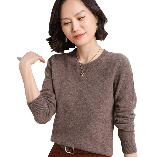 Knitted sweater with a round collar