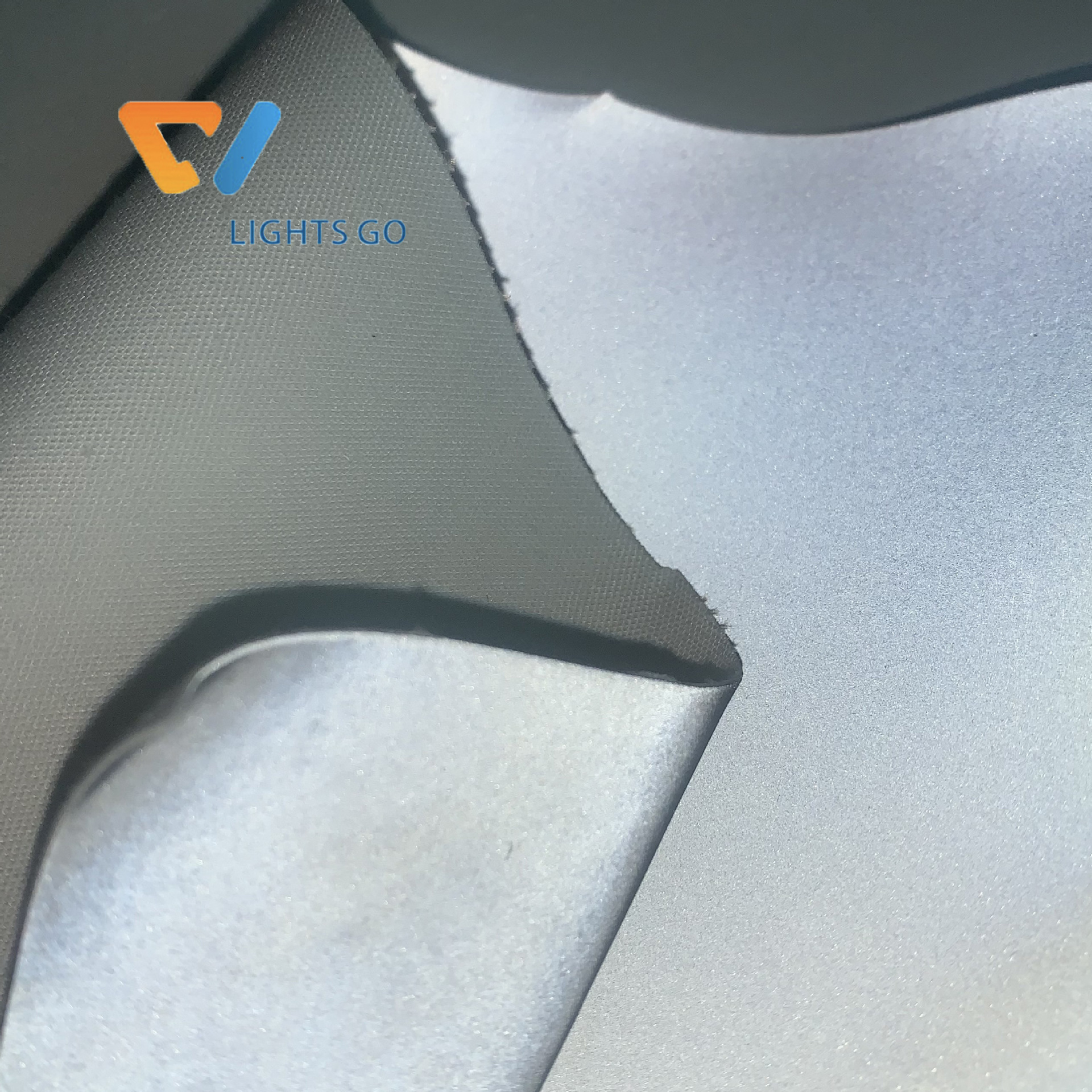 厂家供应 高亮银灰反光PU革  鞋服饰箱包用环保银白 彩色反光革