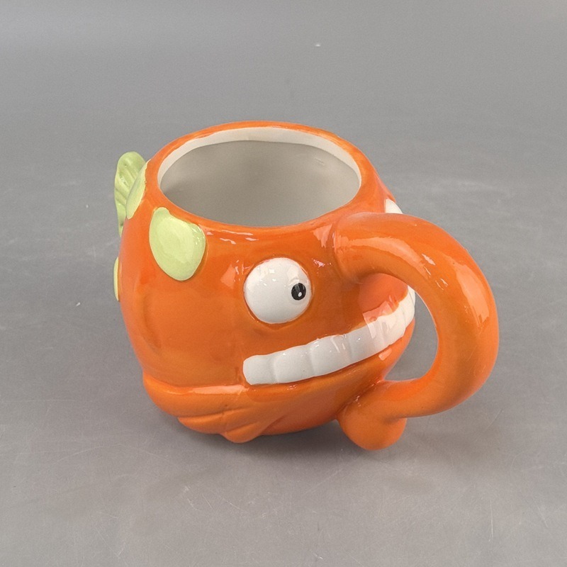 Cerámica piraña Taza de dibujos animados de cerámica Taza de animales tridimensional Taza de café universal de cerámica pintada a mano de alto valor