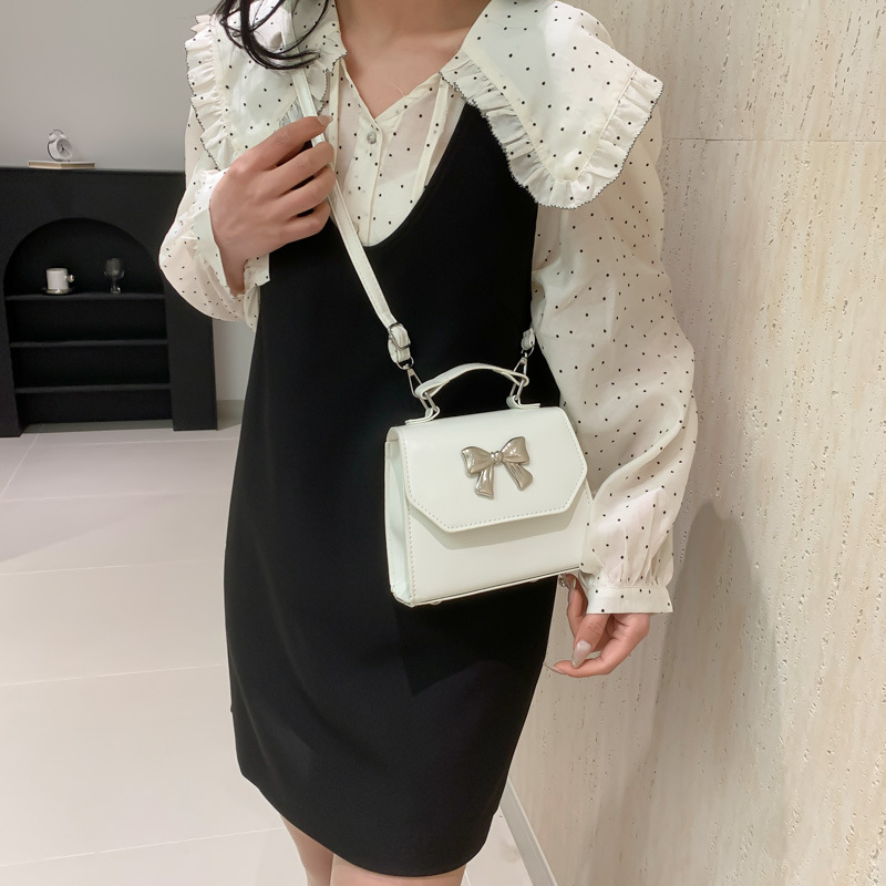 2025 nuevo estilo francés personalidad mochila de hombro de mujer alta sensación de moda simple de hombro de mano pequeña bolsa de mano coreana