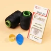 2 rolls of black thread + 16 needles + thumb + thimble
