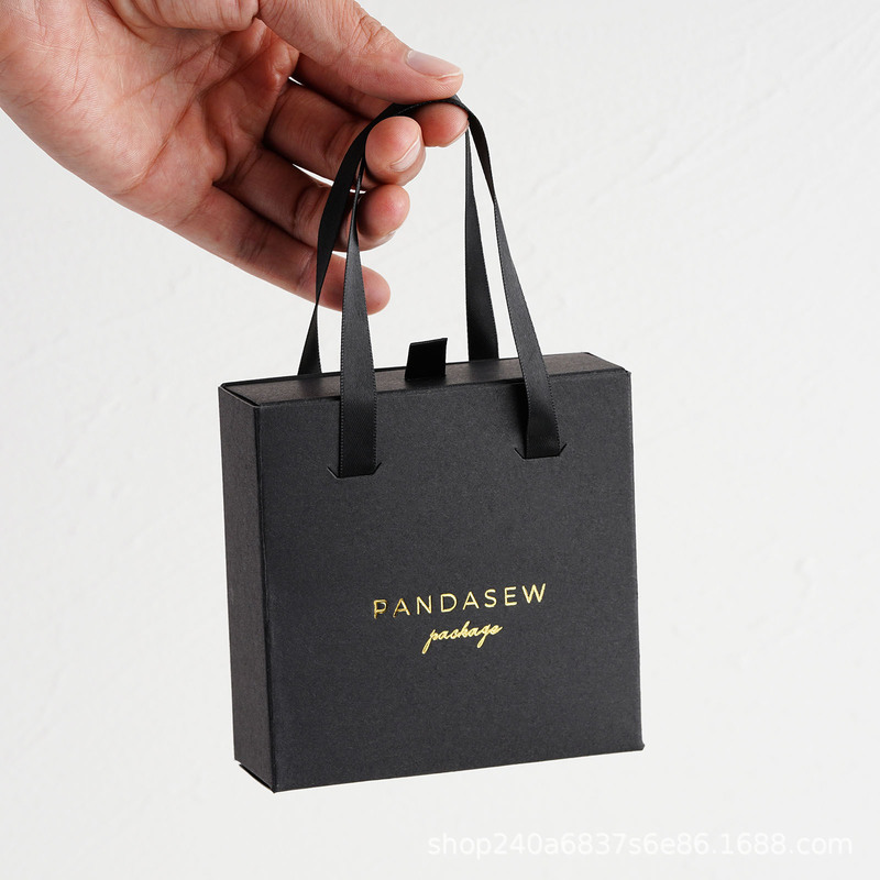 陽に花を咲かせるxpandasewはロゴを印刷して白い手持ち式の引き出しの箱のネックレスのイヤリングの指輪のピアスの箱を印刷します。|undefined