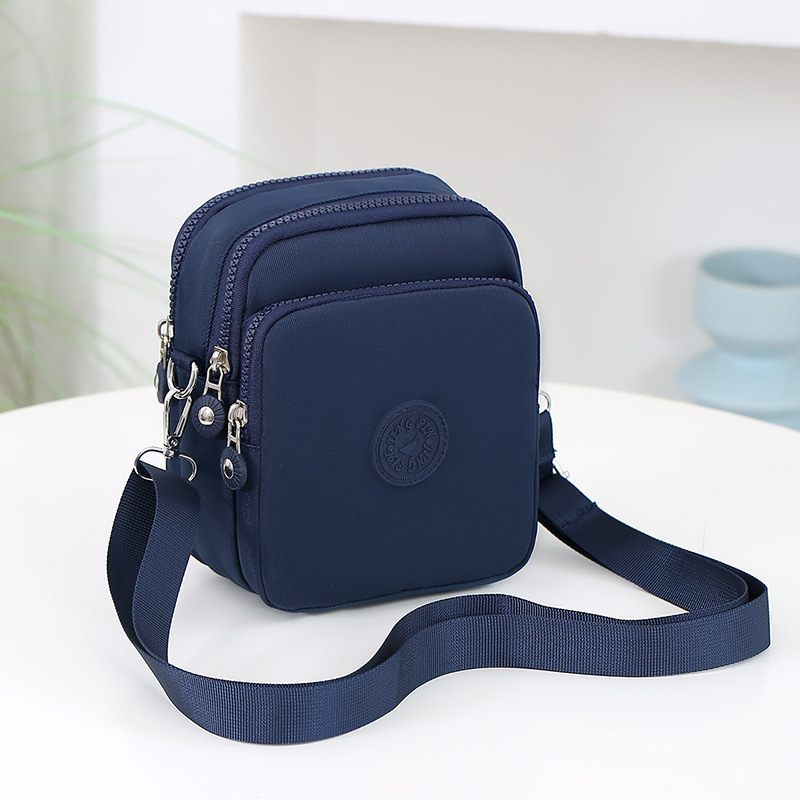 Borsa a tracolla a tre scomparti da donna in tela oxford_voghion.com
