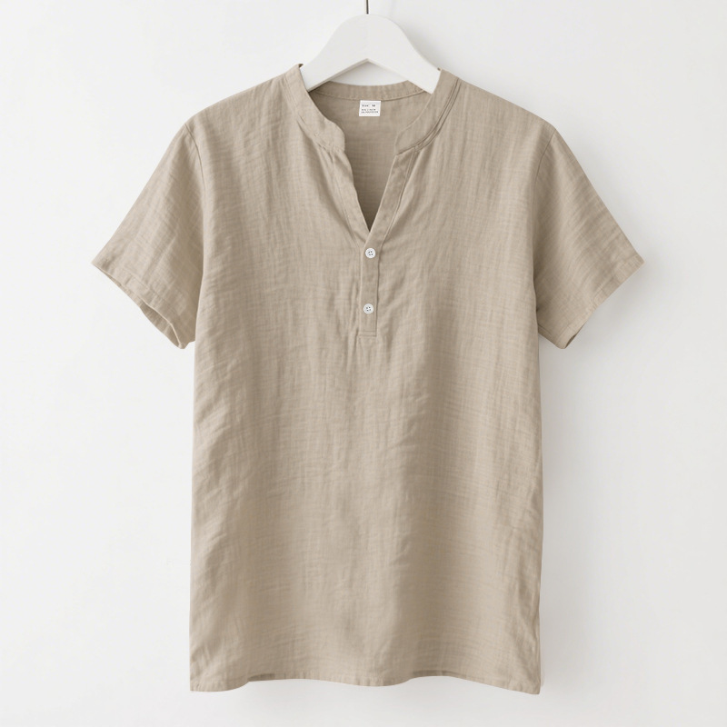 Camisa suelta casual de verano para hombres europeos y americanos, camisa de color sólido de lino de manga corta con cuello alto de moda para hombres