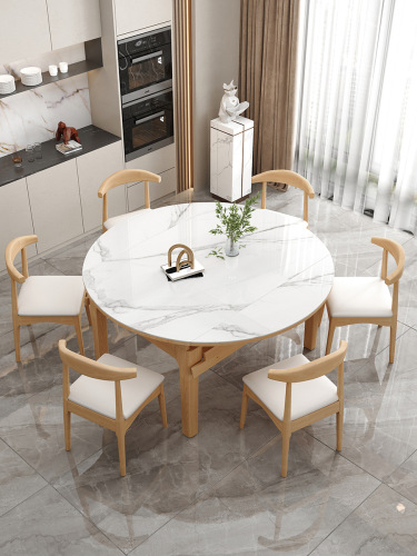 A solid wood and stone-top dining table for home use, small apartment, convertible round and square table with an electric stove, and adjustable extension table