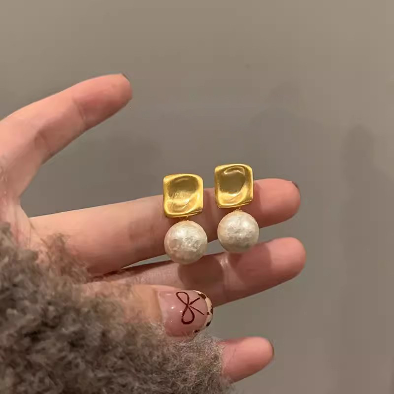 Pendientes de flor con perla y aguja de plata, estilo elegante y retro