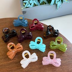 新商品の不規則な蝶結びの小さい蝶々は後頭部を掛けて挟みます。