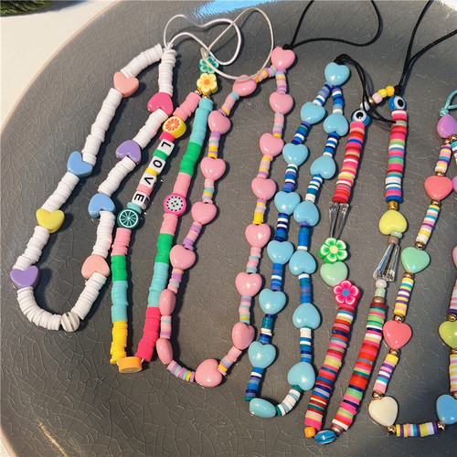 Korean version of the new ins creative bohemian soft pottery love flower beaded mobile phone lanyard acrylic mobile phone chain