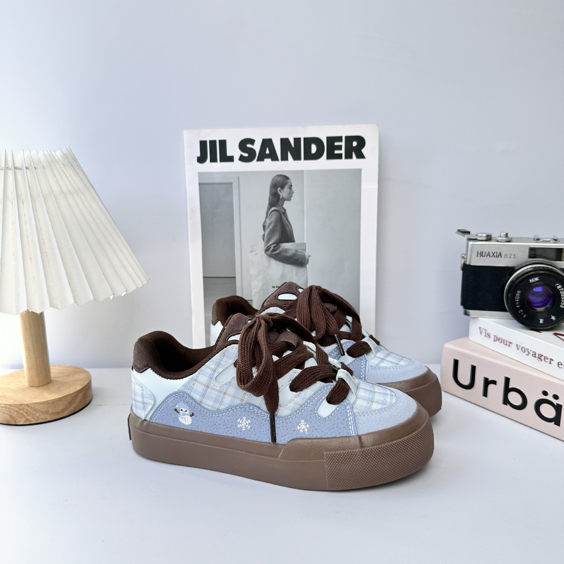 Zapatos deportivos y casuales de ondas distantes para niños y niñas en otoño de 2025 nuevos tipos de explosión, todos los tipos de zapatos de skate de suela gruesa ligera para padres