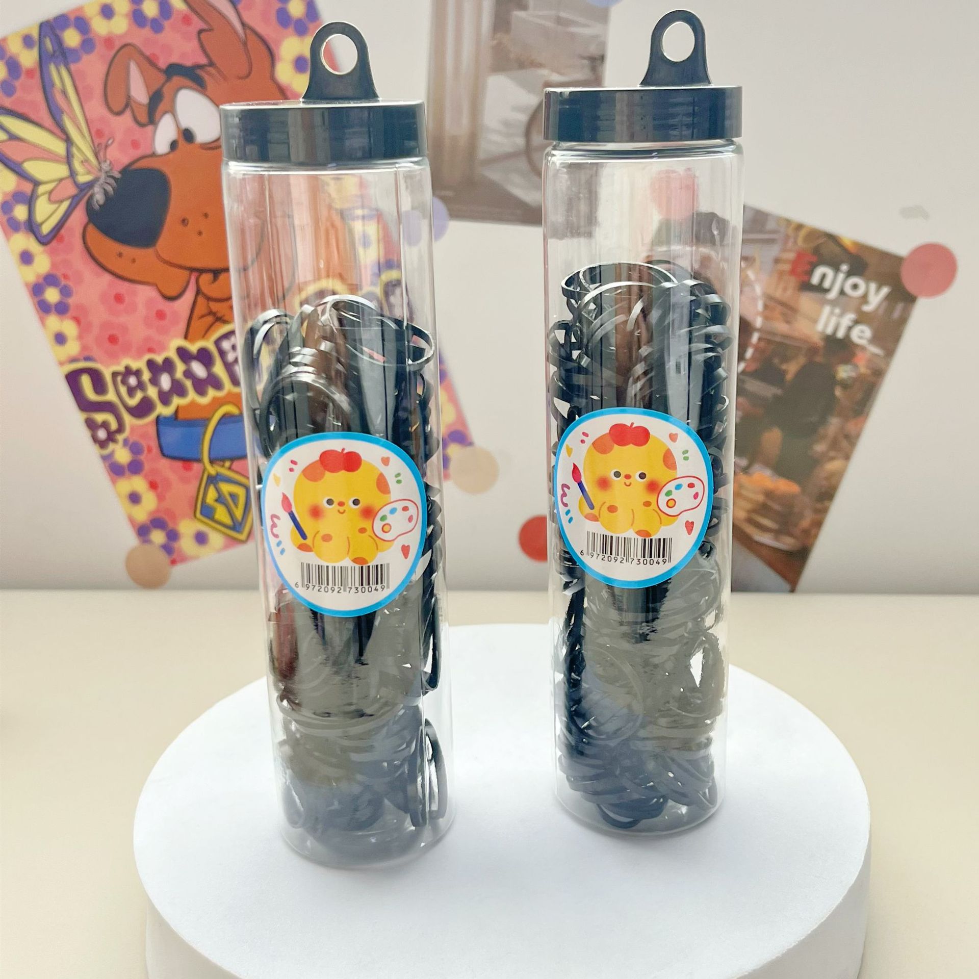 Yiwu al por mayor dibujos animados enlatados cabeza de cuerda de goma desechable negro colorido para niños no lastimar anillo de pelo cinta de goma encantadora