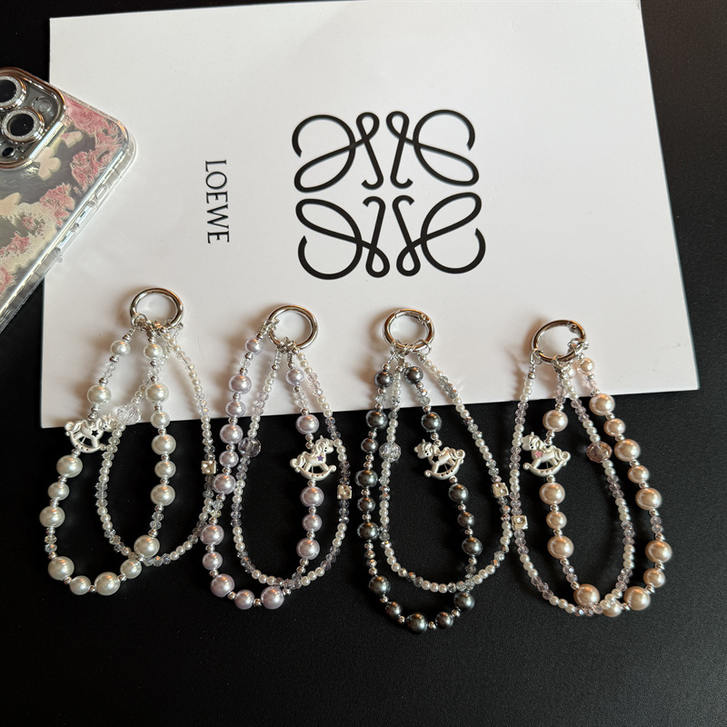 New trendy crystal alloy pony phone pearl wristband phone chain, high-end lanyard bag, double-layer exquisite
